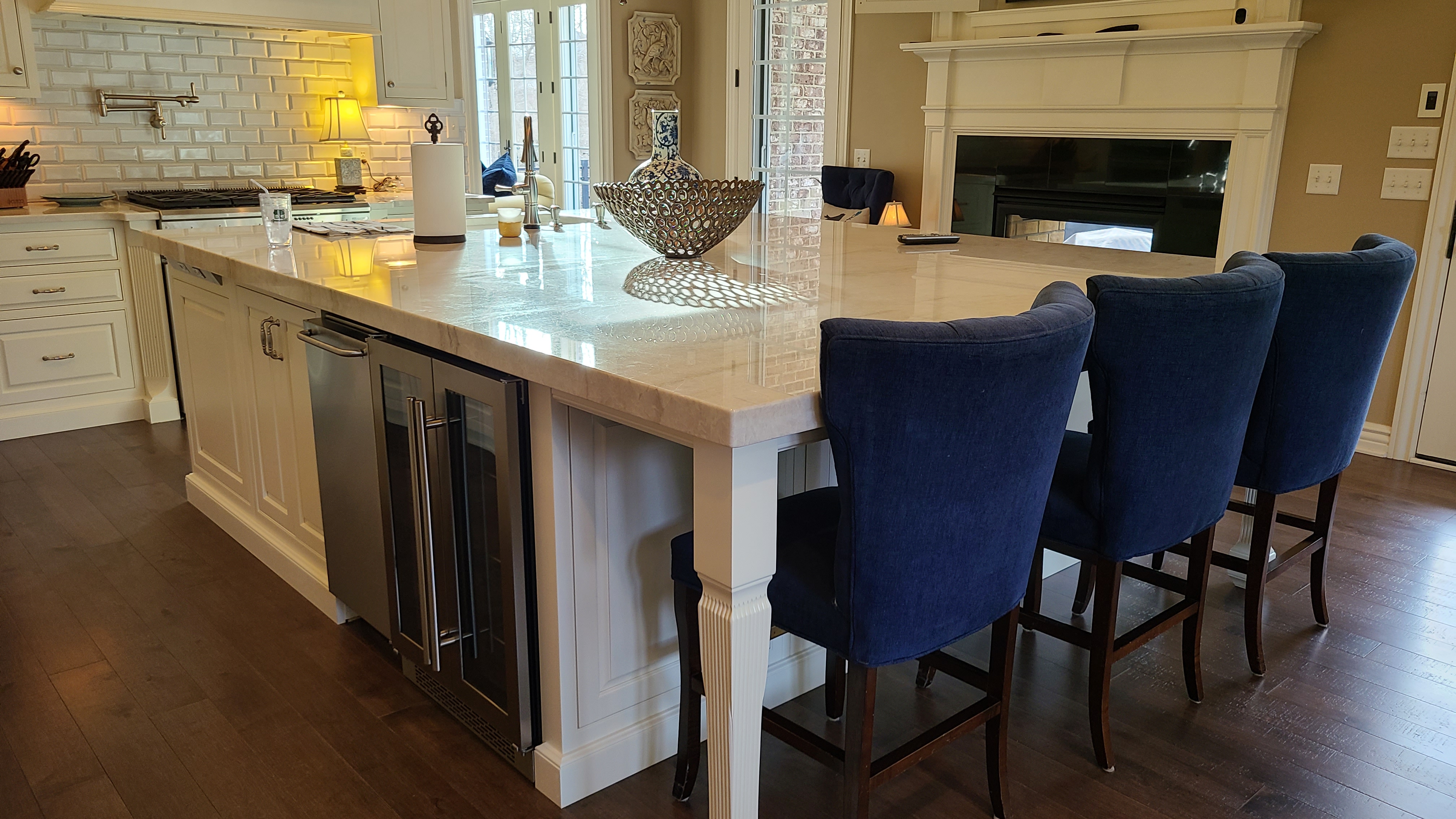 Taj Mahal Quartzite kitchen island with seating.