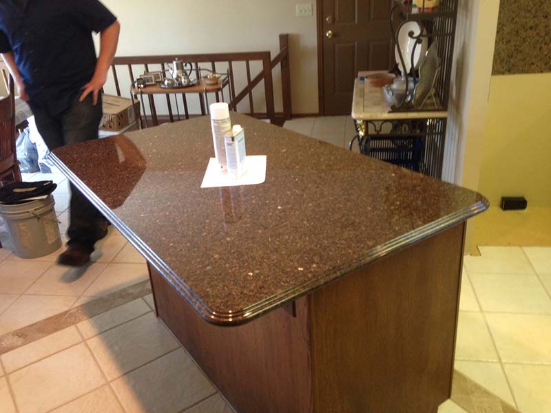 Brown Pearl (Imperial Coffee) Granite kitchen island.