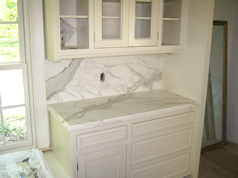 Honed Calacatta Marble kitchen counter and backsplash.