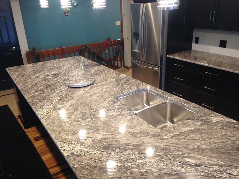 White Thunder Granite kitchen island and matching Lazy Susan.