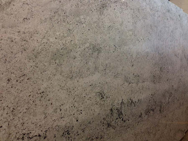 Polished Colonial White Granite Slab