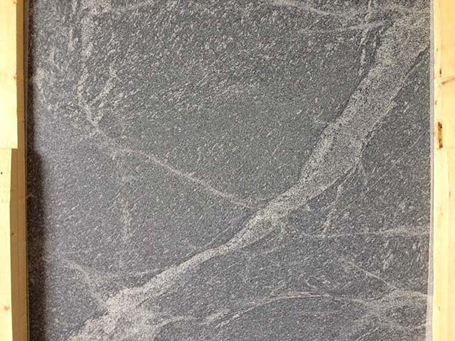 Honed Silver Gray Granite slab with white movement.