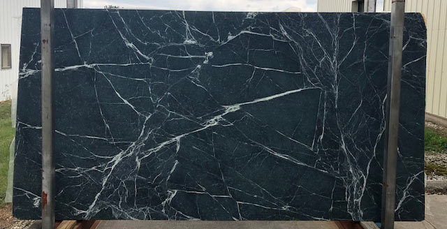 High contrast movement in this slab of Mystic Soapstone.